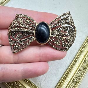 Vintage Brass Tone Ribbon Bow Brooch With Black Faux Stone
